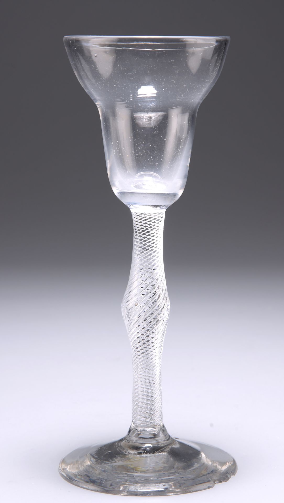AN 18TH CENTURY PAN-TOP WINE GLASS