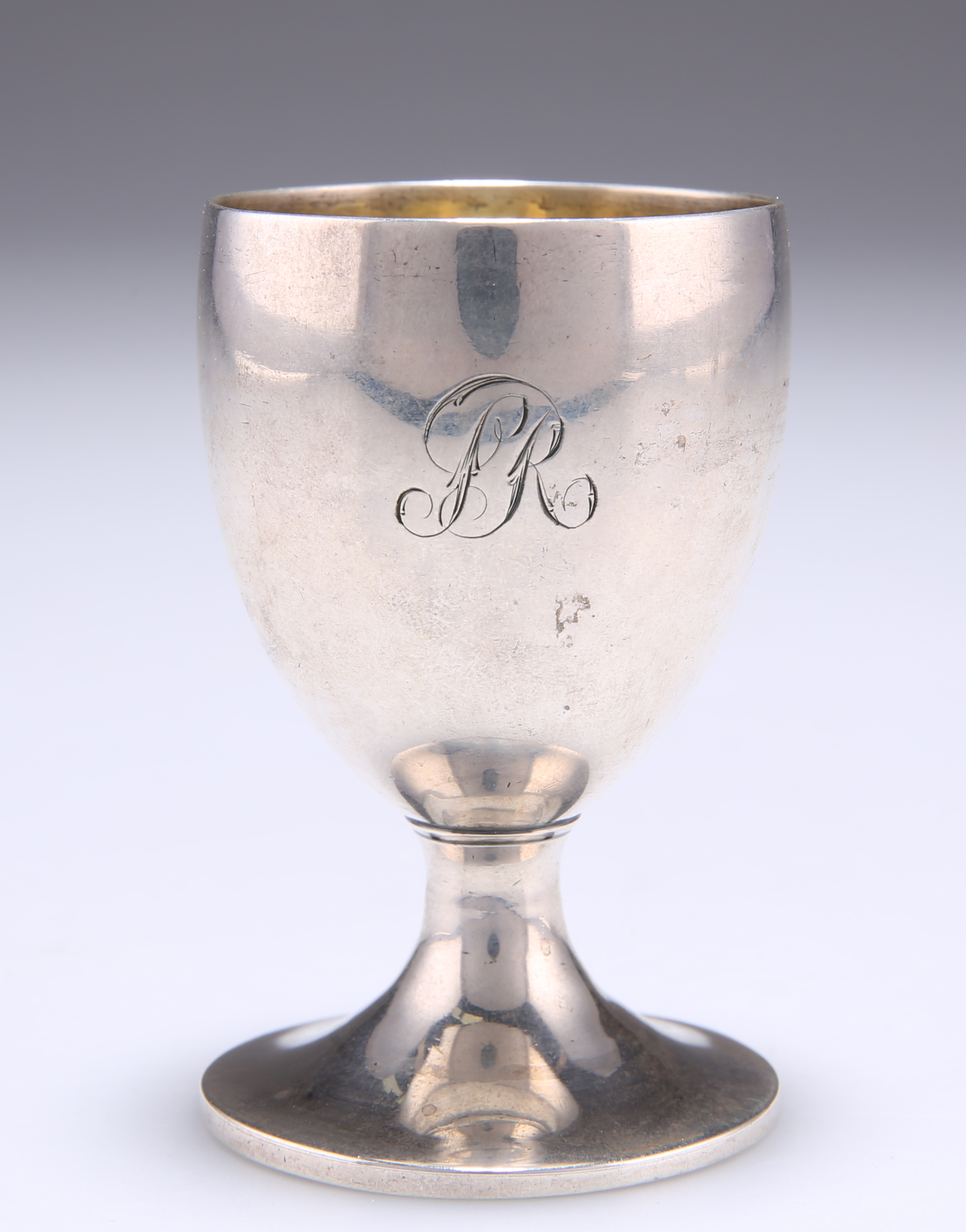 A GEORGE III SILVER EGG CUP