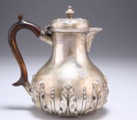 A VICTORIAN SILVER HOT WATER JUG