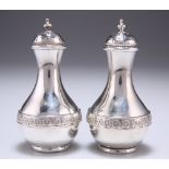 A PAIR OF VICTORIAN SILVER PEPPERS
