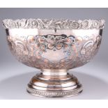 A SILVER-PLATED PUNCH BOWL