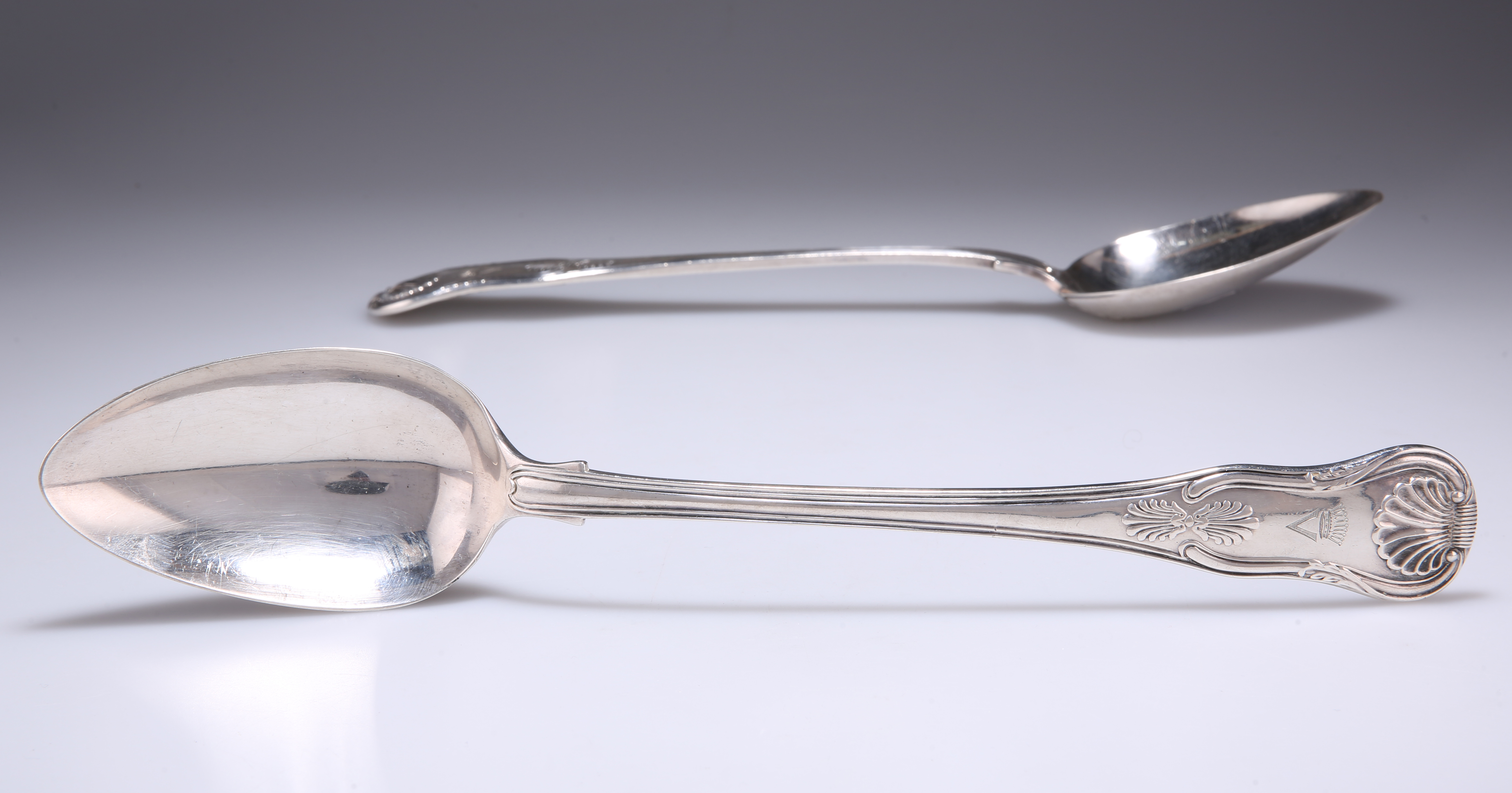 A LARGE PAIR OF GEORGE III SILVER BASTING SPOONS
