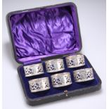 A GOOD SET OF SIX GEORGE V SILVER NAPKIN RINGS