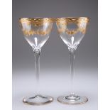 A PAIR OF CONTINENTAL GILDED WINE GLASSES, CIRCA 1895