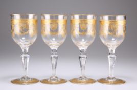 A SET OF FOUR GILDED WINE GLASSES