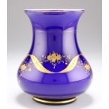 A BOHEMIAN BLUE AND GILT GLASS VASE, CIRCA 1880