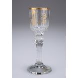 AN EARLY 19TH CENTURY GILDED LIQUEUR GLASS