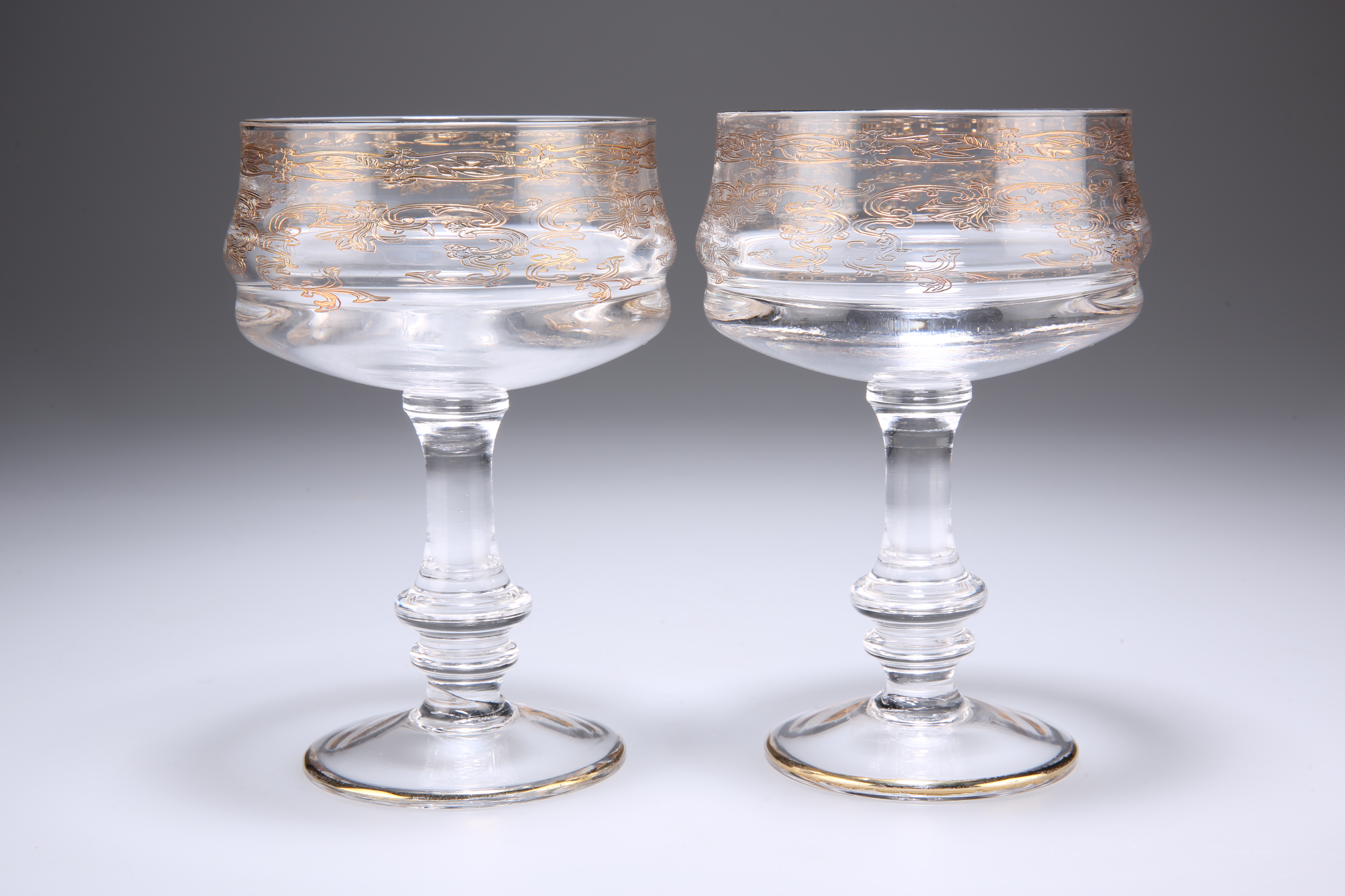 A PAIR OF GLASS PEDESTAL SORBET DISHES
