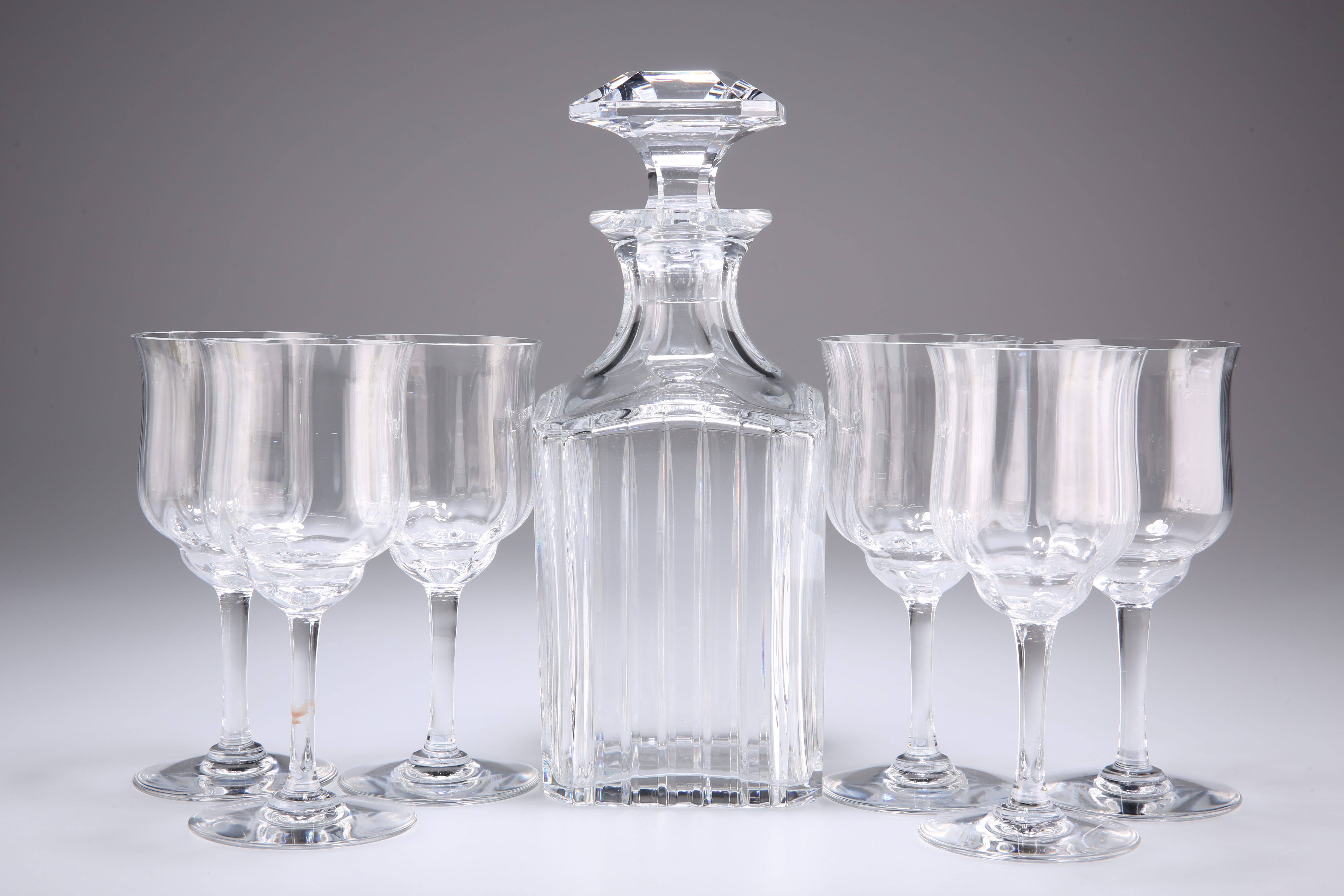 A BACCARAT CRYSTAL DECANTER AND STOPPER WITH SIX GLASSES