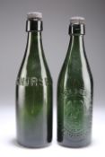 TWO GREEN GLASS BOTTLES