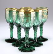 A RARE SET OF SIX BOHEMIAN GREEN AND GILDED WINE GLASSES, CIRCA 1790