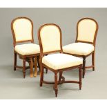 THREE MAHOGANY AND UPHOLSTERED CHAIRS FROM THE DINING SALOON OF R.M.S. MAJESTIC