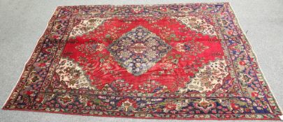 A VINTAGE PERSIAN TABRIZ CARPET