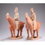 TWO CHINESE POTTERY HORSES AND RIDERS