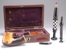 A CASED MEERSCHAUM EBONY AND MOTHER OF PEARL INLAID PIPE