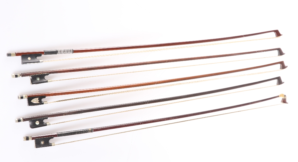 A BUNDLE OF VIOLIN BOWS