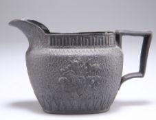 A 19TH CENTURY BLACK BASALT JUG