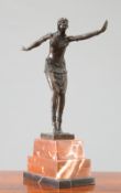 AN ART DECO STYLE BRONZE FIGURE OF A DANCER