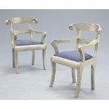 A PAIR OF SILVERED METAL ARMCHAIRS IN THE ANGLO-INDIAN STYLE