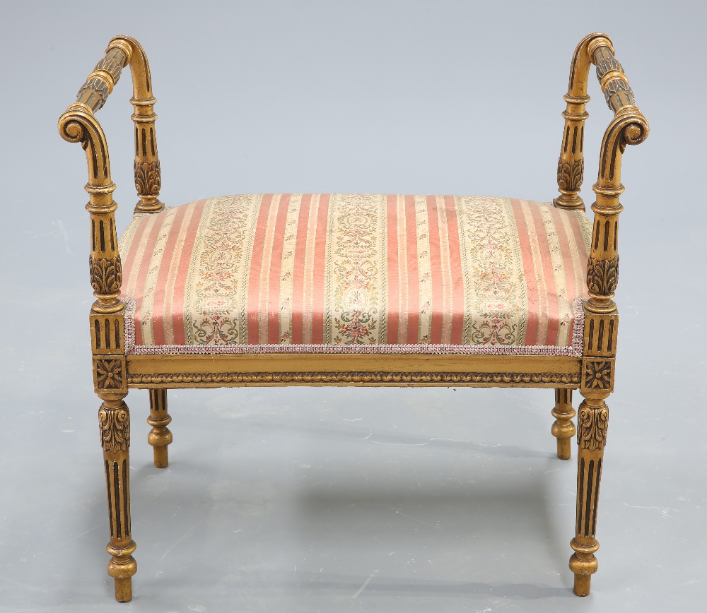 AN ADAM STYLE GILTWOOD AND UPHOLSTERED STOOL