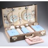 A MID 20TH CENTURY BREXTON PICNIC BASKET SET FOR FOUR PERSONS