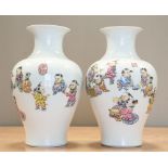 A PAIR OF CHINESE FAMILLE ROSE PORCELAIN 'BOYS' VASES