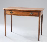 A GEORGE III BOW-FRONT MAHOGANY SIDE TABLE