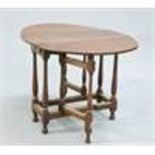 A SMALL OAK GATELEG TABLE