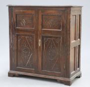 AN 18TH CENTURY AND LATER OAK CABINET