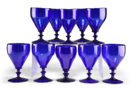 A GROUP OF TEN EARLY 19TH CENTURY BRISTOL BLUE GLASS RUMMERS