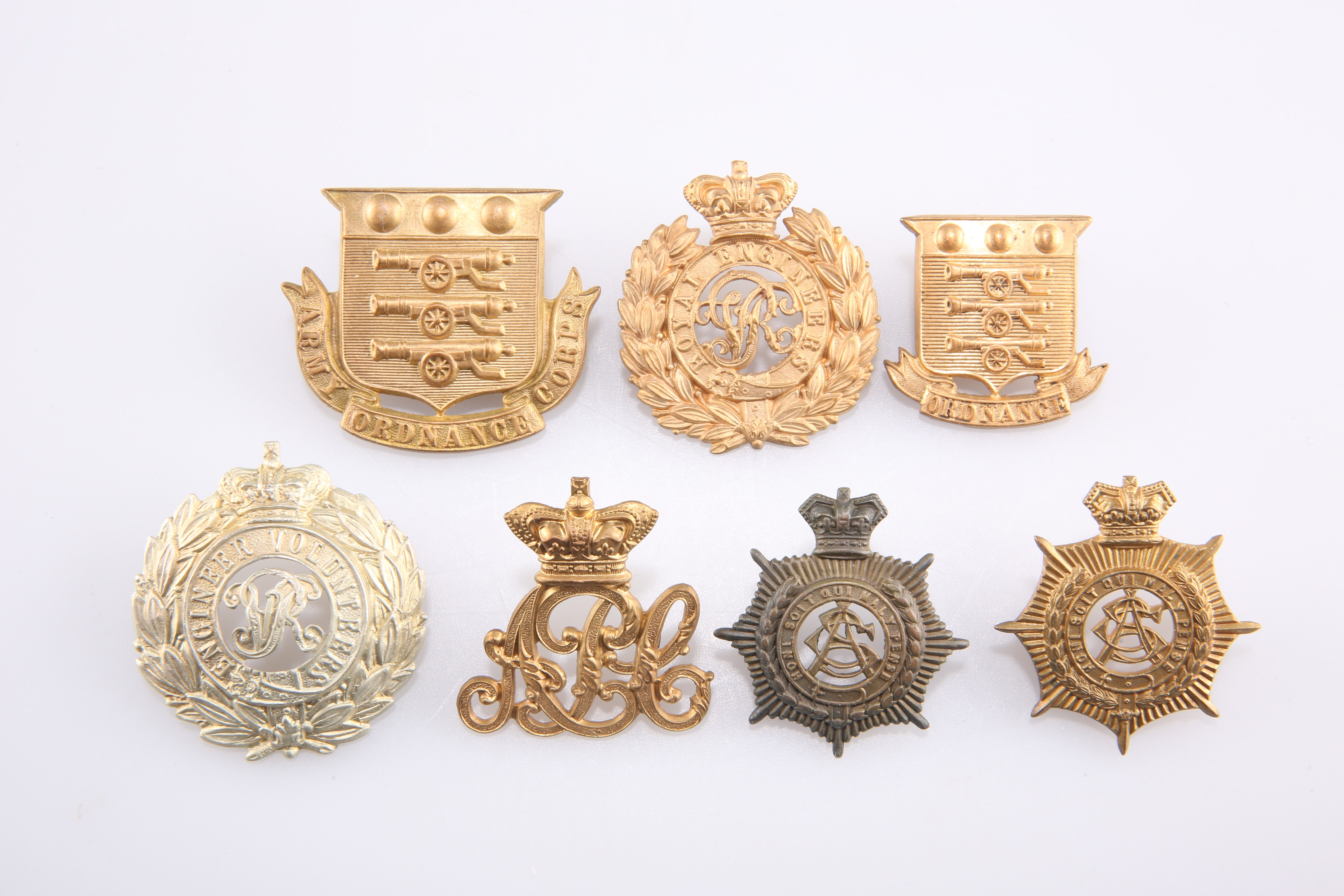 SEVEN VICTORIAN PERIOD OTHER RANKS' PATTERN CAP BADGES