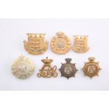 SEVEN VICTORIAN PERIOD OTHER RANKS' PATTERN CAP BADGES