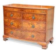 A 19TH CENTURY MAHOGANY BOW-FRONT CHEST OF DRAWERS