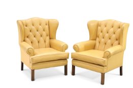 A PAIR OF GEORGIAN STYLE MUSTARD LEATHER WING-BACK ARMCHAIRS