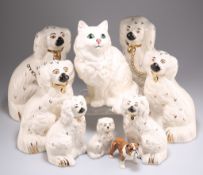 THREE GRADUATED PAIRS OF ROYAL DOULTON MODELS OF SEATED SPANIELS