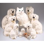 THREE GRADUATED PAIRS OF ROYAL DOULTON MODELS OF SEATED SPANIELS