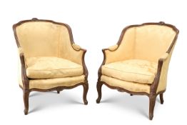 A PAIR OF FRENCH WALNUT AND UPHOLSTERED ARMCHAIRS, CIRCA 1900