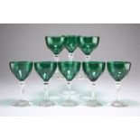 A SET OF EIGHT EARLY 19TH CENTURY BRISTOL GREEN GLASS WINES