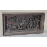AN 18TH CENTURY CARVED OAK PANEL