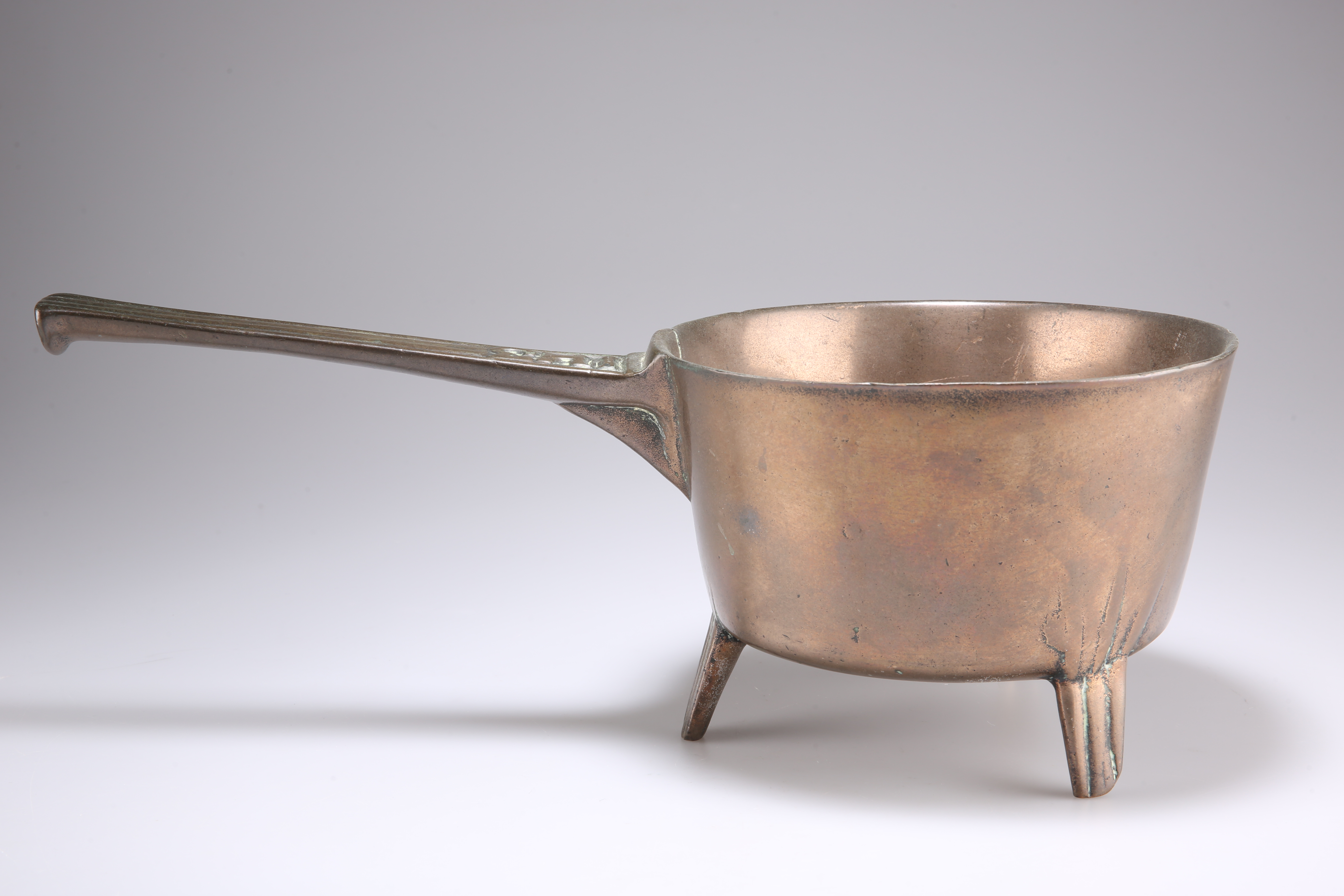 AN 18TH CENTURY BRONZE OR BELL-METAL SKILLET