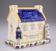 A STAFFORDSHIRE POTTERY CHAPEL MONEY BOX