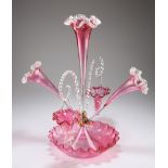 A VICTORIAN CRANBERRY GLASS EPERGNE