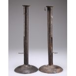 A PAIR OF EARLY 19TH CENTURY SHEET IRON CANDLESTICKS