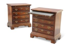 A PAIR OF GEORGE III STYLE MAHOGANY CHESTS OF DRAWERS