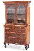 A VICTORIAN MAHOGANY BOOKCASE ON CHEST