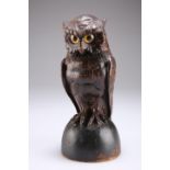 A BLACK FOREST CARVED AND STAINED SOFTWOOD MODEL OF AN OWL