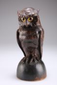 A BLACK FOREST CARVED AND STAINED SOFTWOOD MODEL OF AN OWL