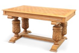 A CARVED OAK AND PARQUETRY CENTRE TABLE