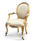 A LOUIS XV STYLE GILTWOOD AND UPHOLSTERED FAUTEUIL