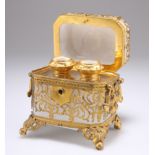 A CONTINENTAL GILT-METAL MOUNTED OPALINE GLASS SCENT BOTTLE CASKET